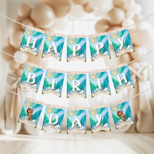 A “Happy Birthday” banner made of small flag cards strung together, each with ocean-themed background and letters.