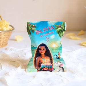 A chip bag design wrapped around a snack bag showing a tropical beach scene and birthday girl illustration.