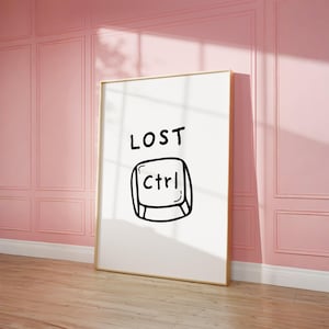 Puede incluir: Un póster enmarcado blanco con texto negro que dice "LOST Ctrl" y una ilustración en blanco y negro de una tecla de computadora con la palabra "Ctrl" en ella.