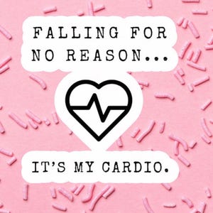 May include: A pink background with pink sprinkles and text that reads "FALLING FOR NO REASON... IT'S MY CARDIO." A black heart with a heartbeat line is in the center of the image.