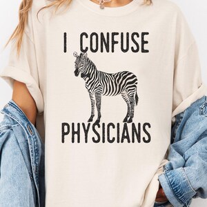 Undiagnosed Wife CRPS Humor I Confuse Physicians EBV Rare Illness Awareness Gift Idea Medical Mystery Shirt Funny Rare Disease Gift Idea for