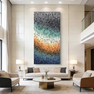 May include: A large rectangular wall art piece composed of numerous vertical wooden slats of varying lengths. The slats feature a gradient color transition from dark charcoal gray at the top to teal, then warm orange, and deep navy blue at the bottom.