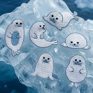 May include: A set of three ceramic mugs with a speckled, matte finish. The mugs are in shades of cream, light gray, and dark gray. Each mug has a simple, minimalist design, perfect for coffee or tea.