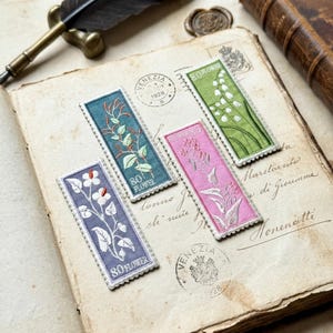 May include: A rustic wooden sign with the text "Welcome to our home" in white lettering. The sign features a distressed finish and a simple, inviting design, perfect for front door decor.