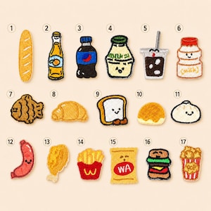 May include: A collection of seventeen embroidered patches featuring various food and drink items, including a baguette, soda bottles, milk, a croissant, a fish-shaped pastry, a burger, fries, and a snack bag with the text WA, all numbered one through seventeen.