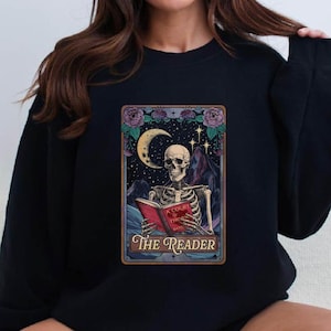 The Reader Tarot Card Sweatshirt, Skeleton Reading Shirt, Unisex Tarot Card Shirt, Book Lover Gift, Bookish Gift,Tarot Lover Gift