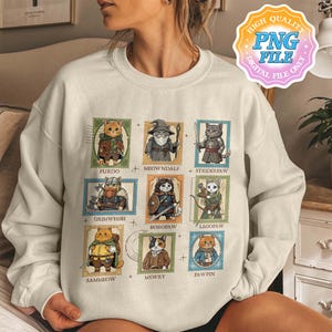 Op de afbeelding: Cr&egrave;mekleurige sweatshirt met kattenillustraties in postzegelontwerpen. Elke postzegel toont een ander kattenpersonage met namen als "Furdo" en "Meowndale". Het ontwerp bevat de tekst "HIGH QUALITY PNG FILE DIGITAL FILE ONLY."