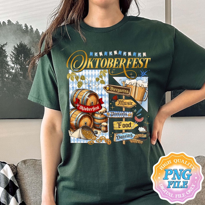 May include: Dark green t-shirt featuring an Oktoberfest design. The graphic includes wooden barrels, beer steins, pretzels, and directional signs for Biergarten, Music, Food, and Dancing. The word "Oktoberfest" is written in gold script.