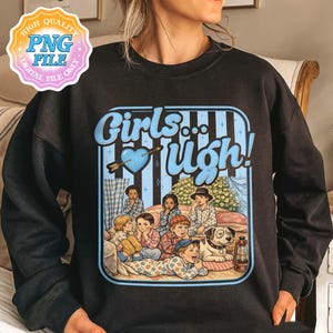 May include: Black sweatshirt with a retro-style graphic. The graphic features the text "Girls... Ugh!" in blue, along with an illustration of children in pajamas, a dog, and a heart pierced by an arrow. The design has a vintage aesthetic.