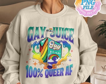 May include: A white sweatshirt with a rainbow-colored graphic of a juice box that says "Gay Juice" and "100% Queer AF".