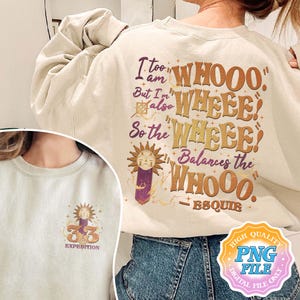 May include: Cream-colored sweatshirt with the text "I too am WHOOOO: But I'm also WHEEE! So the WHEEE! Balances the WHOOOO." A smaller graphic on the front features a sun and the number "33" with the word "EXPEDITION".