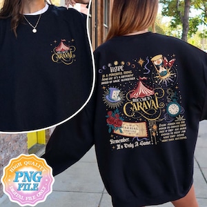 May include: Black sweatshirt with a colourful "Caraval" design. The front features a small circus tent graphic and the word "Caraval". The back has a larger design with text, a clock, hourglass, and a ticket that says "Caraval Admit One".