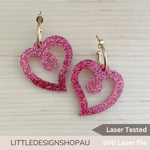 May include: A pair of pink glitter heart-shaped earrings with gold hoops. Laser Tested SVG Laser file.