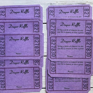 May include: Purple diaper raffle tickets with the text "Diaper Raffle" and "Bring a pack of diapers in any size for a chance to win a prize". The tickets have a space for a name and the numbers 827830.