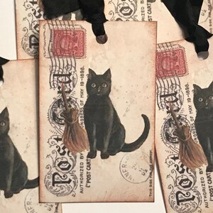 May include: Vintage style black cat gift tags with a broom and the text "Post Card" and "Authorized by "Post Card" Congress of May 19-1898."