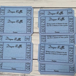 May include: Eight blue raffle tickets with the text "Diaper Raffle" and instructions to bring a pack of diapers for a chance to win a prize. Each ticket has a space for a name and the number 827830.