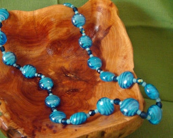 Necklace earrings of sky blue lampwork beads