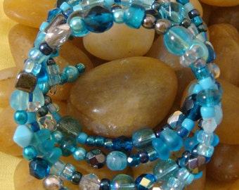 Bracelet, aqua and silver, glass beads, memory wire, regular