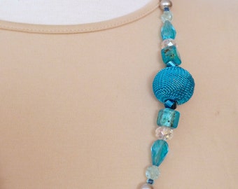 Silver pearl necklace with an aqua mesh ball, aqua and clear glass bead accents 29"