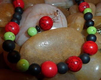 Necklace and earrings of red and lime turquoise and black onyx