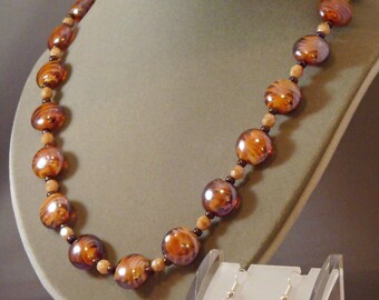 Necklace earrings of topaz lampwork beads