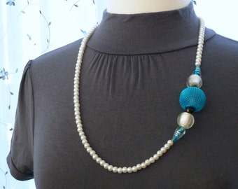 White pearl necklace with an aqua mesh ball, aqua and white foil glass bead accents 29"