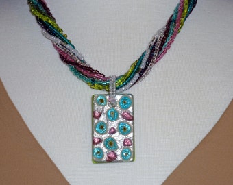 Necklace with silver teal iris Murano pendant and 9 interchangeable beaded necklaces of multiple colors