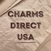 CharmsDirectUS store logo