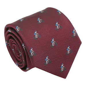 May include: A burgundy silk tie with a repeating pattern of cyclists riding bicycles.
