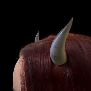 Devil horns