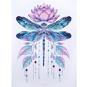 May include: Cross-stitch design featuring a dragonfly with intricate details. The dragonfly has blue, purple, and teal wings, a blue body, and is topped with a pink lotus flower. The design includes leaves and hanging beads.