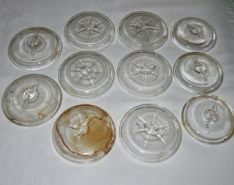 Collection of 11 antique glass MASON JAR LIDS Ball, Hazel Atlas starburst wire bail lid for jars