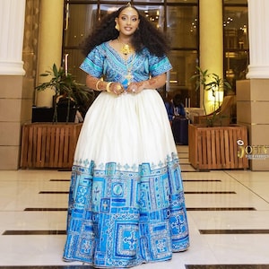 blue ethiopian dress Delightful Blue Traditional Ethiopian Dress: Intricately Handcrafted Habesha Dress for Any Grand Holidays and Events Habesha Kemis XXL main image 1