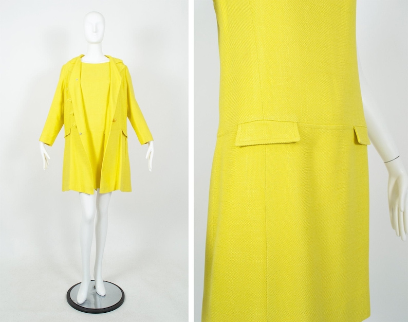 May include: A bright yellow dress and matching coat set. The dress has a simple, straight silhouette and the coat has a classic collar and long sleeves.