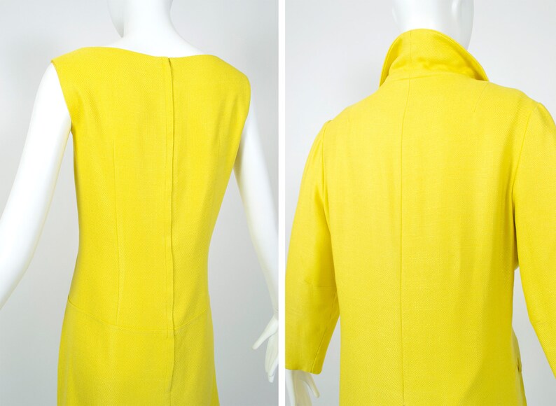 May include: Back view of a yellow sleeveless dress with a simple design. The dress has a straight cut and a back zipper.