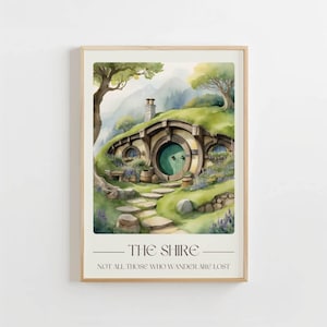 May include: A watercolor painting of a hobbit hole in The Shire, a fictional location from the Lord of the Rings books. The house is green and brown with a round green door. The text "The Shire" and "Not all those who wander are lost" is below the image.