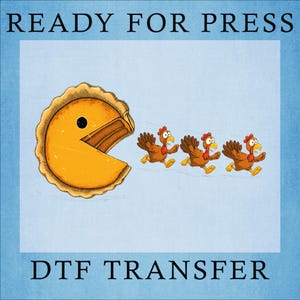 May include: A DTF transfer design featuring a pie slice with a Pac-Man-like mouth chasing three cartoon turkeys. The words "READY FOR PRESS" and "DTF TRANSFER" are printed in black.