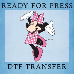 May include: DTF transfer featuring Minnie Mouse in a pink polka dot dress and bow, with white gloves and shoes. The image has the text "READY FOR PRESS" at the top and "DTF TRANSFER" at the bottom, set against a light blue background.