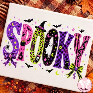 May include: A white rectangular canvas featuring the word SPOOKY in large, stylized letters. Each letter has a unique pattern including purple stars, pink, green leopard print, black with a ghost, purple checkerboard, and pink stripes with bows.