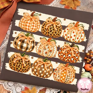 May include: A square sign featuring a dark brown background with horizontal white stripes and nine illustrated pumpkins. Each pumpkin is decorated with different patterns including plaid, leopard print, and polka dots, and topped with a peach bow.
