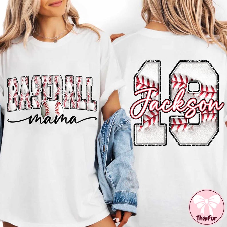 May include: White t-shirt with baseball graphics. The front says "BASEBALL mama" with a baseball image. The back shows the number "19" and the name "Jackson", both with baseball stitching details.