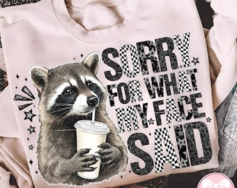 Preppy Sorry For What My Face Said Raccoon PNG, Funny Sarcastic Animal Quote, Cute Wildlife Humor, Trendy Snarky Raccoon Shirt PNG.