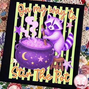 May include: A black fabric print featuring a purple raccoon standing on a small wooden stool, stirring a large purple cauldron with a wooden spoon. The background has vertical lime green stripes, purple stars, and the text On my way to Stir The Pot.
