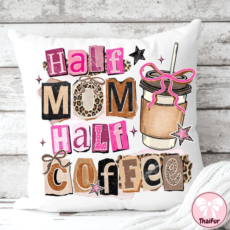 May include: White square pillow with the text "Half Mom Half Coffee" in a collage style. The design includes a coffee cup with a pink bow and star accents. The letters have leopard print and pink accents.