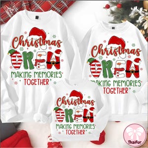 May include: White Christmas Crew sweatshirts with the text "Christmas Crew" in red and green, and the phrase "Making Memories Together". The sweatshirts feature Santa hats and festive designs, ideal for family holiday gatherings.