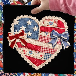 May include: A rustic wooden sign with the text "Welcome to our home" in white lettering. The sign has a distressed finish and a simple, inviting design, suitable for a front porch or entryway.