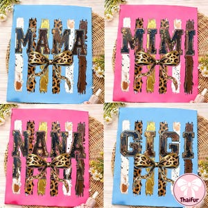 May include: A white ceramic mug with a black handle and the text "But First, Coffee" in a black, handwritten-style font. The mug is on a white surface.