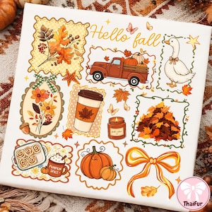 May include: A white rectangular sign featuring colorful autumn-themed illustrations including a red truck, a goose, a coffee cup, pumpkins, a pile of leaves, cinnamon rolls, a candle, and a bow, with the text Hello fall written in orange script.