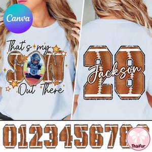 May include: A white t-shirt with a football theme. The front has the text "That's my SON Out There" with a photo of a football player. The back shows the number 28 and the name "Jackson" in a football design.