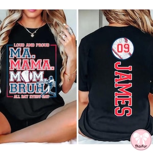 May include: Black t-shirt with a baseball graphic and the text "Loud and Proud Ma. Mama. Mom.  Bruh. All Day Every Day". The back of the shirt has a baseball graphic with the number 09 and the name "James" in red.